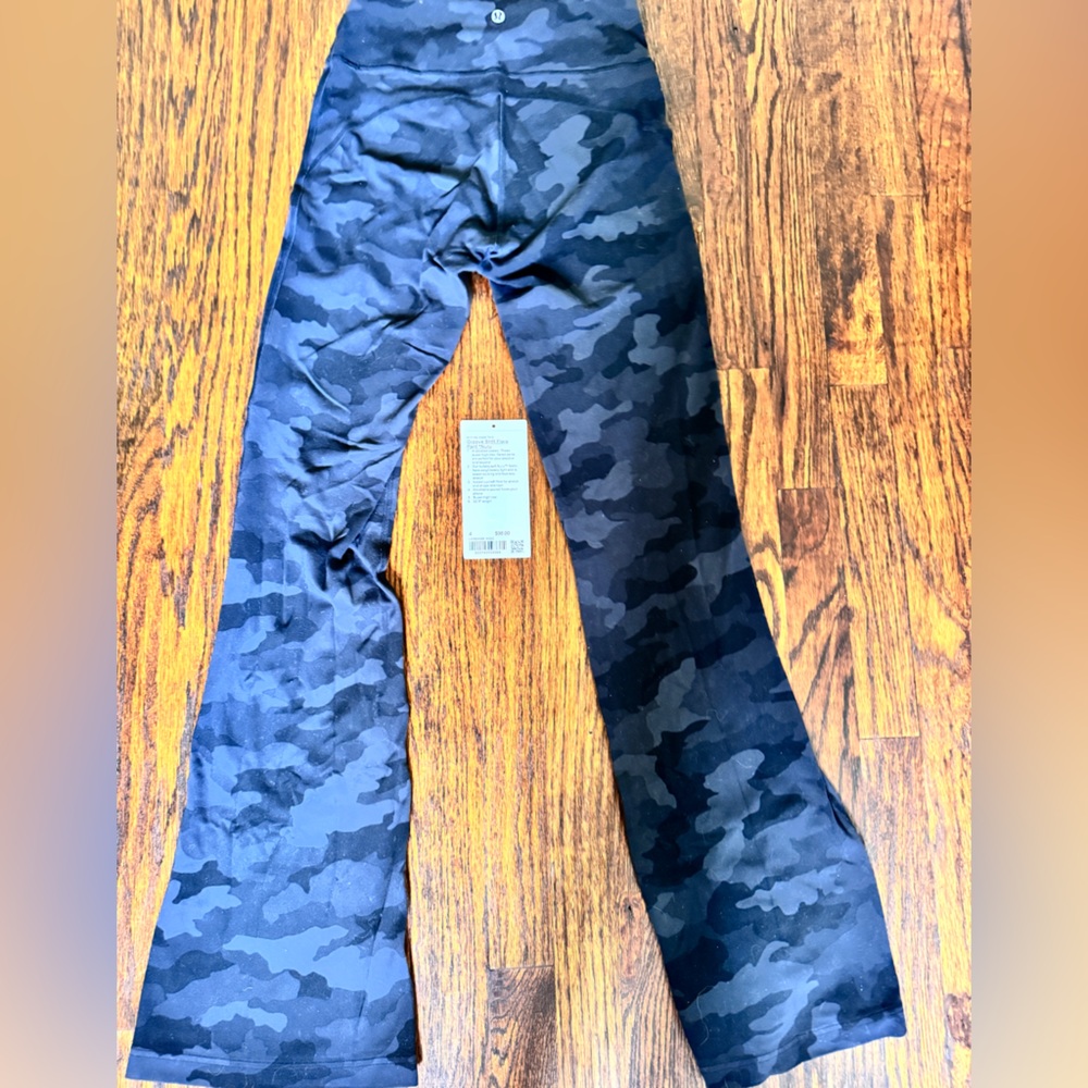 Lululemon Groove SHR Flare Pant Nulu Black and Gray Leggings with Stretchy Fit